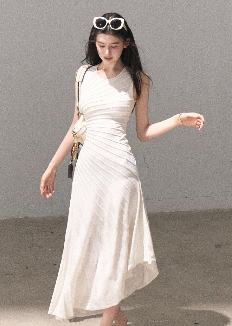 Pearl white sleeveless dress with soft pleated texture