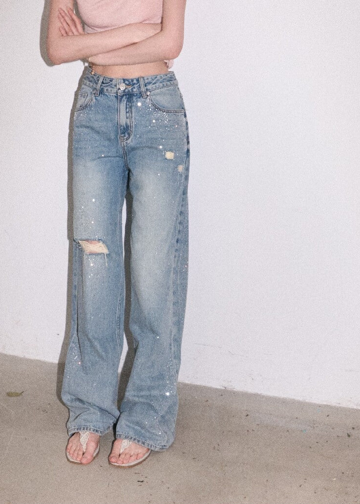 Distressed straight-leg denim pants with starry sparkle