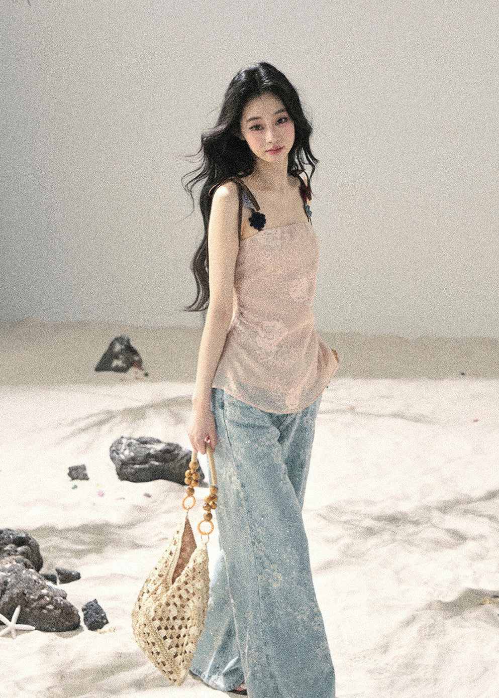 Floral embroidered cami top styled with denim