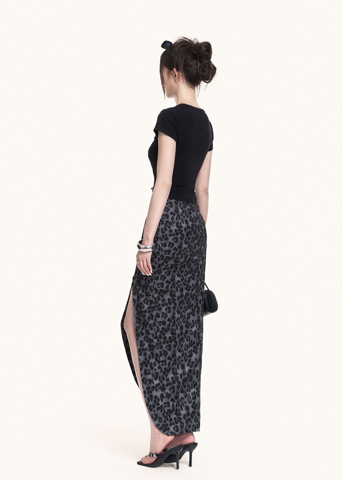 Slim graphic tee and long printed skirt outfit