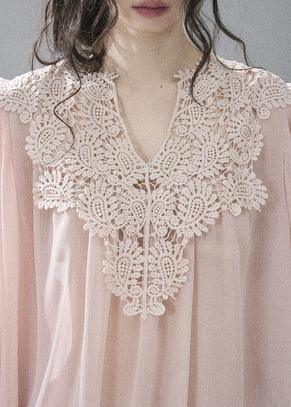 Feminine pink two-piece outfit with floral crochet lace detailing
