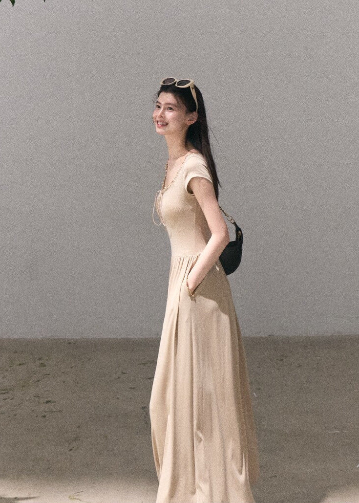 Romantic summer maxi dress with delicate tie detail