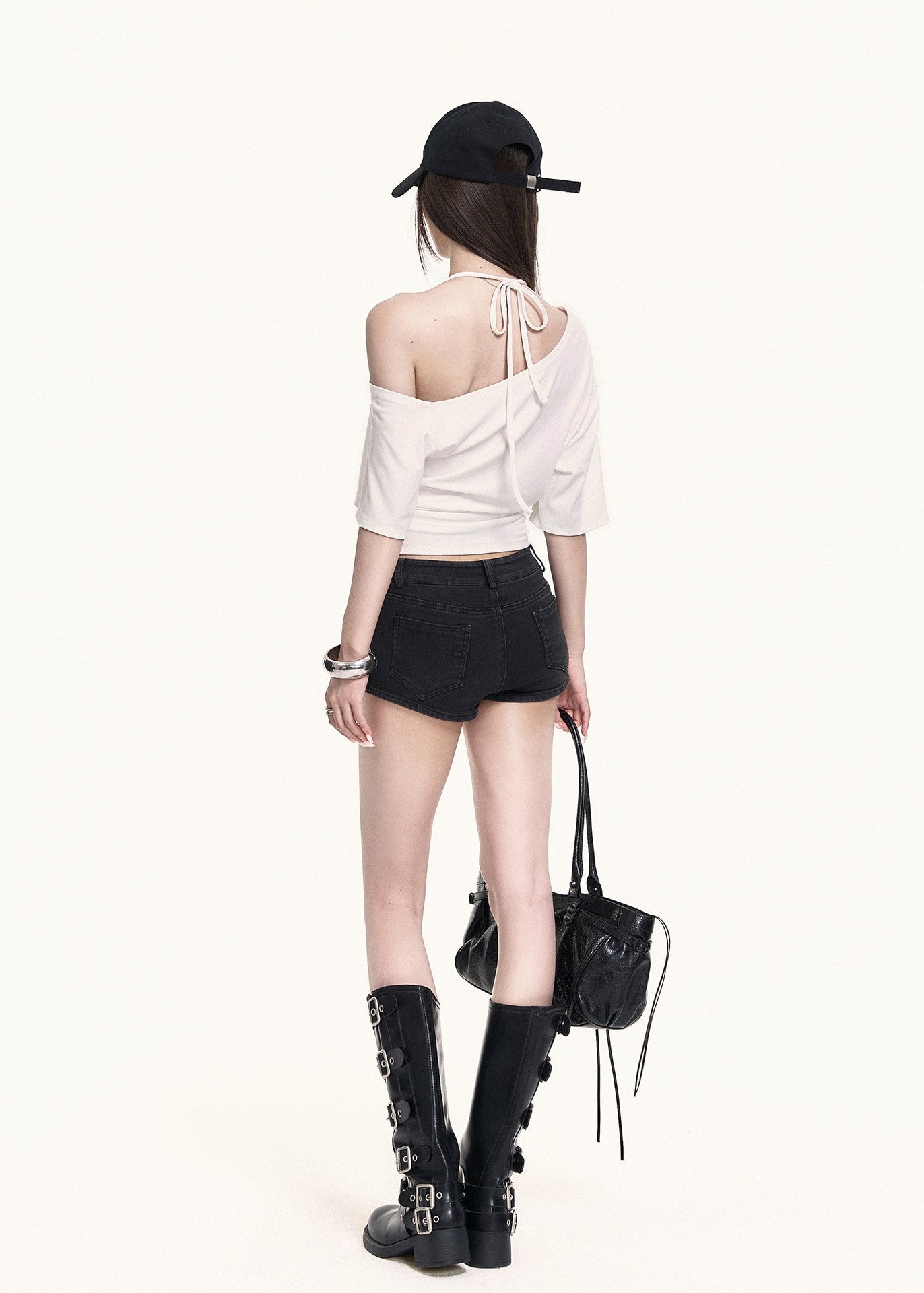 Edgy off-shoulder top with a slim waist fit