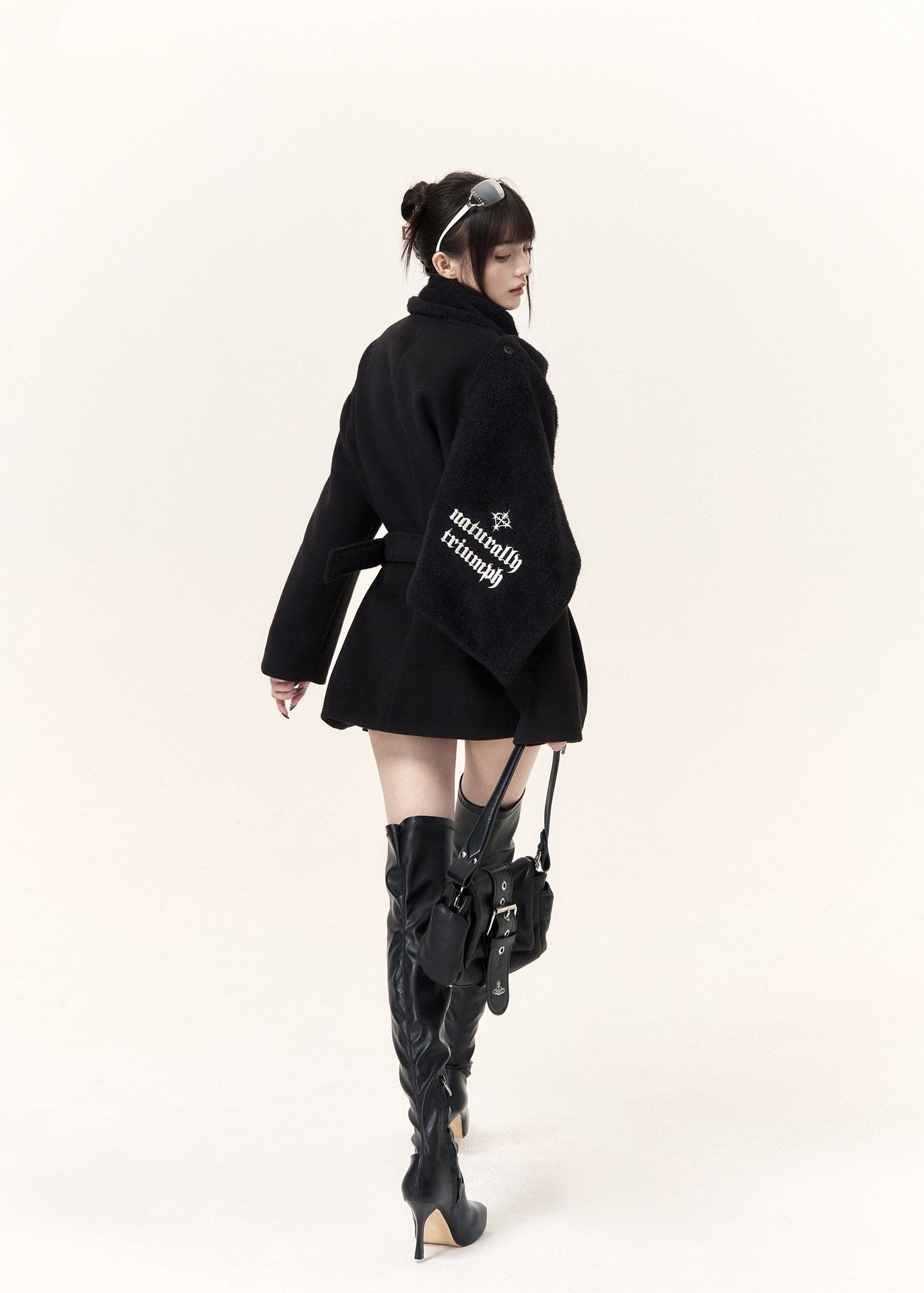 Gothic-inspired black double-breasted coat with statement scarf collar
