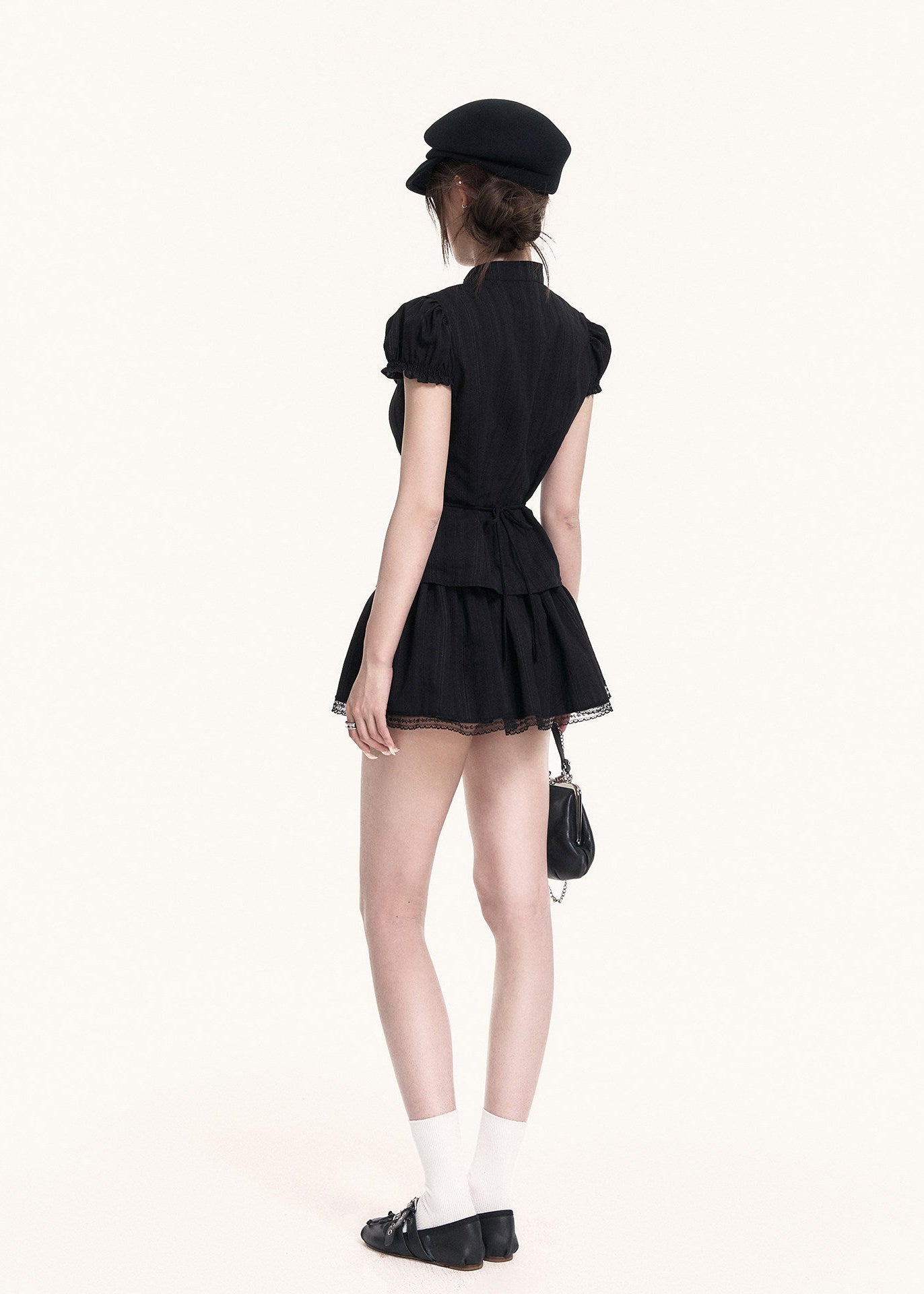 Black lace cutout top and mini skirt set