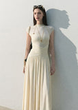 Cream slim-fit knit maxi dress with flowing skirt