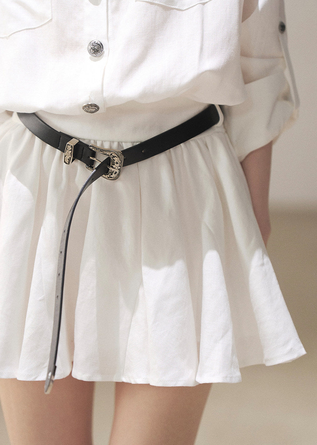 White long sleeve dress with dark shoulder shawl