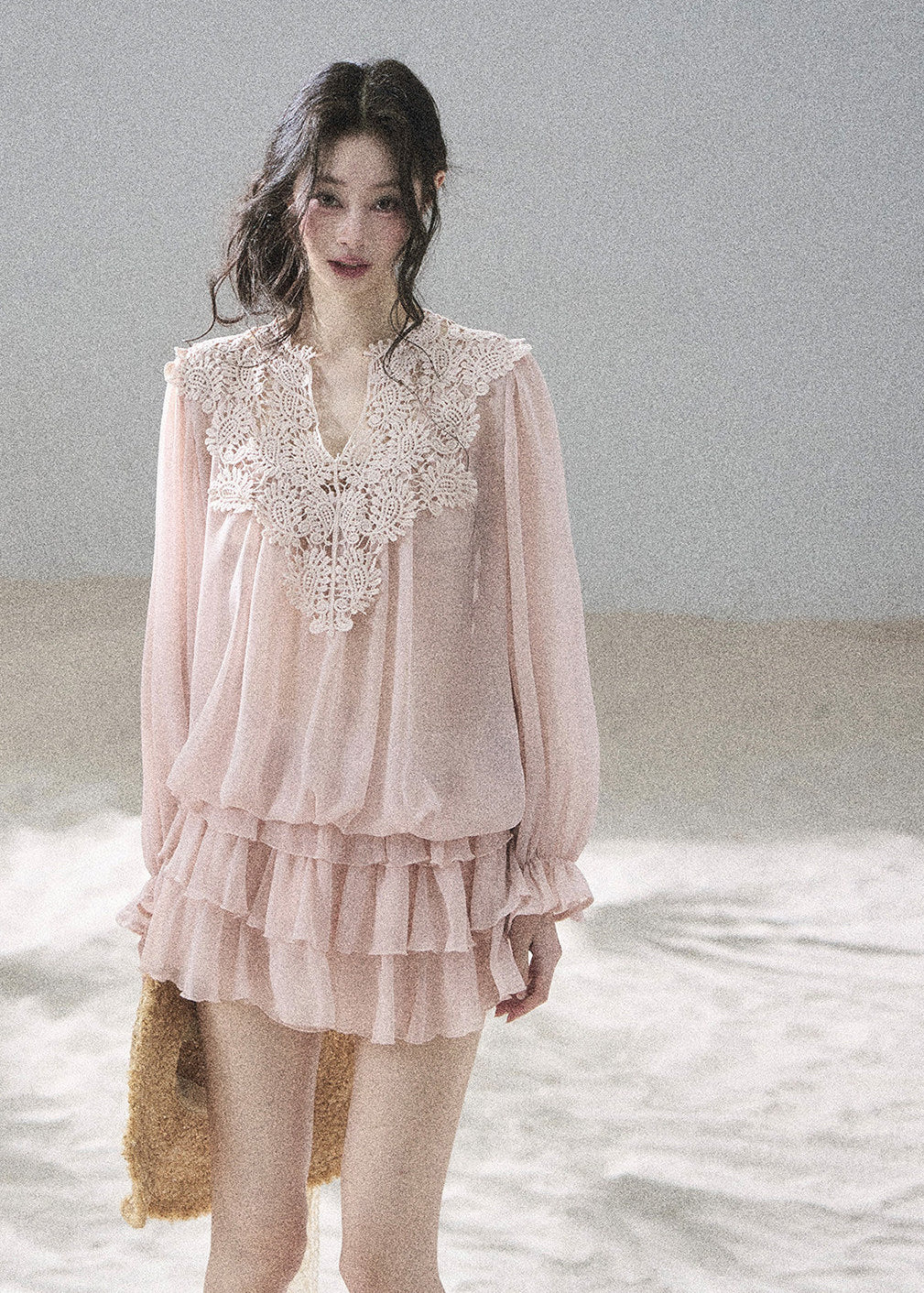 Feminine pink two-piece outfit with floral crochet lace detailing