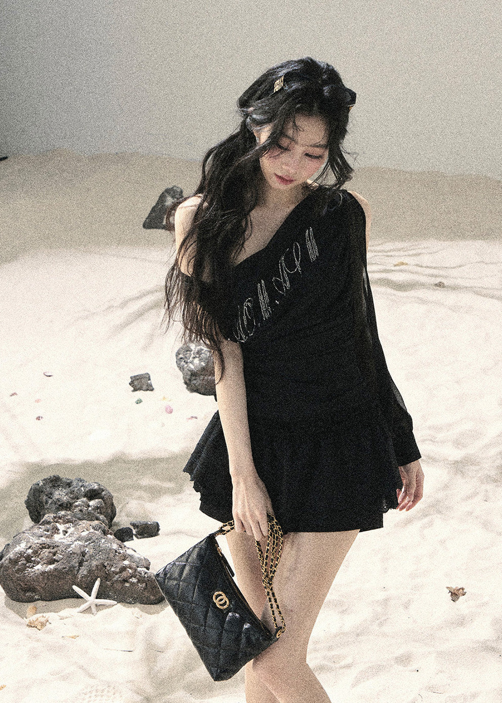 Black fitted off-shoulder top with sparkling front detail