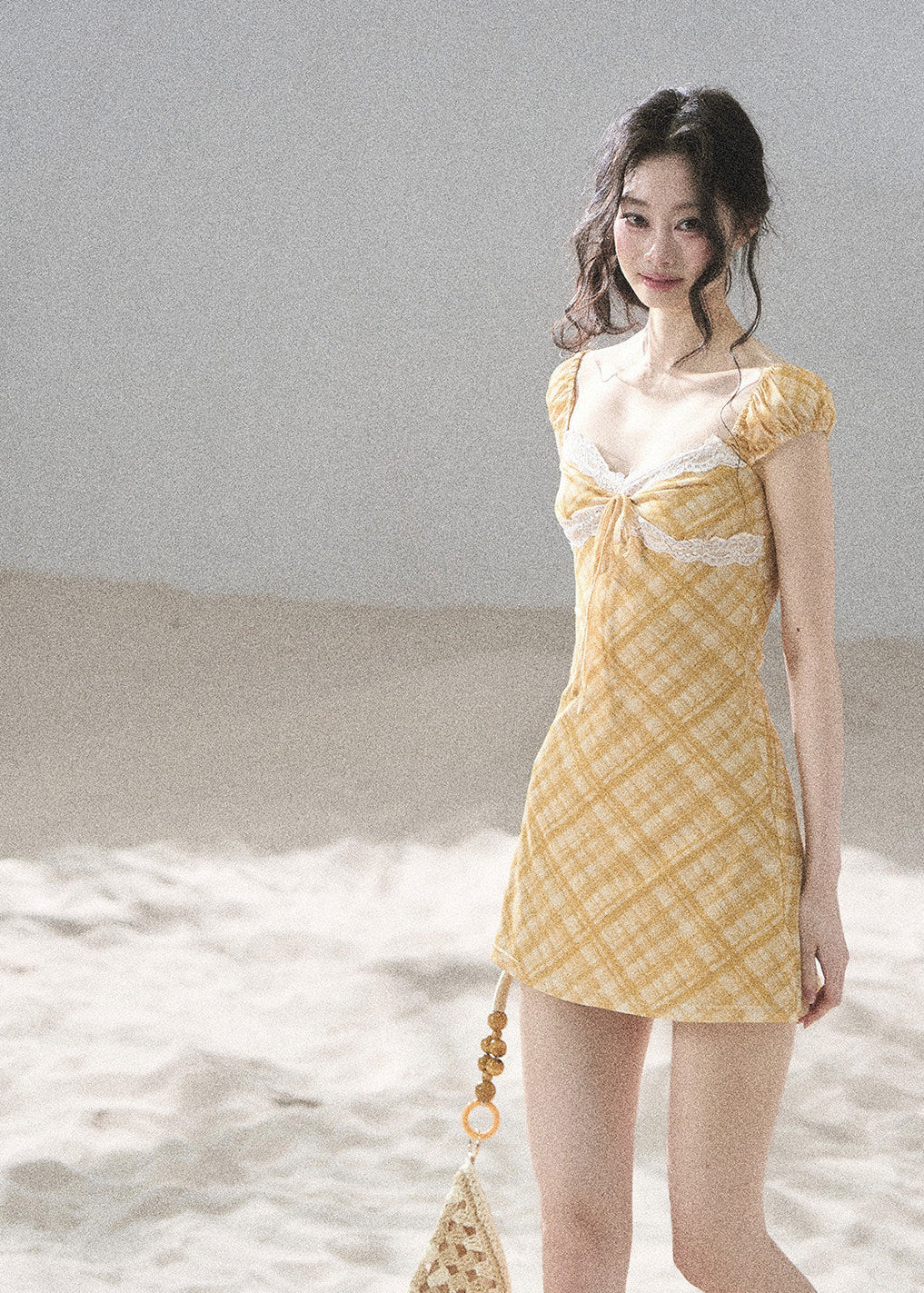Feminine puff-sleeve mini dress in a golden wheat tone