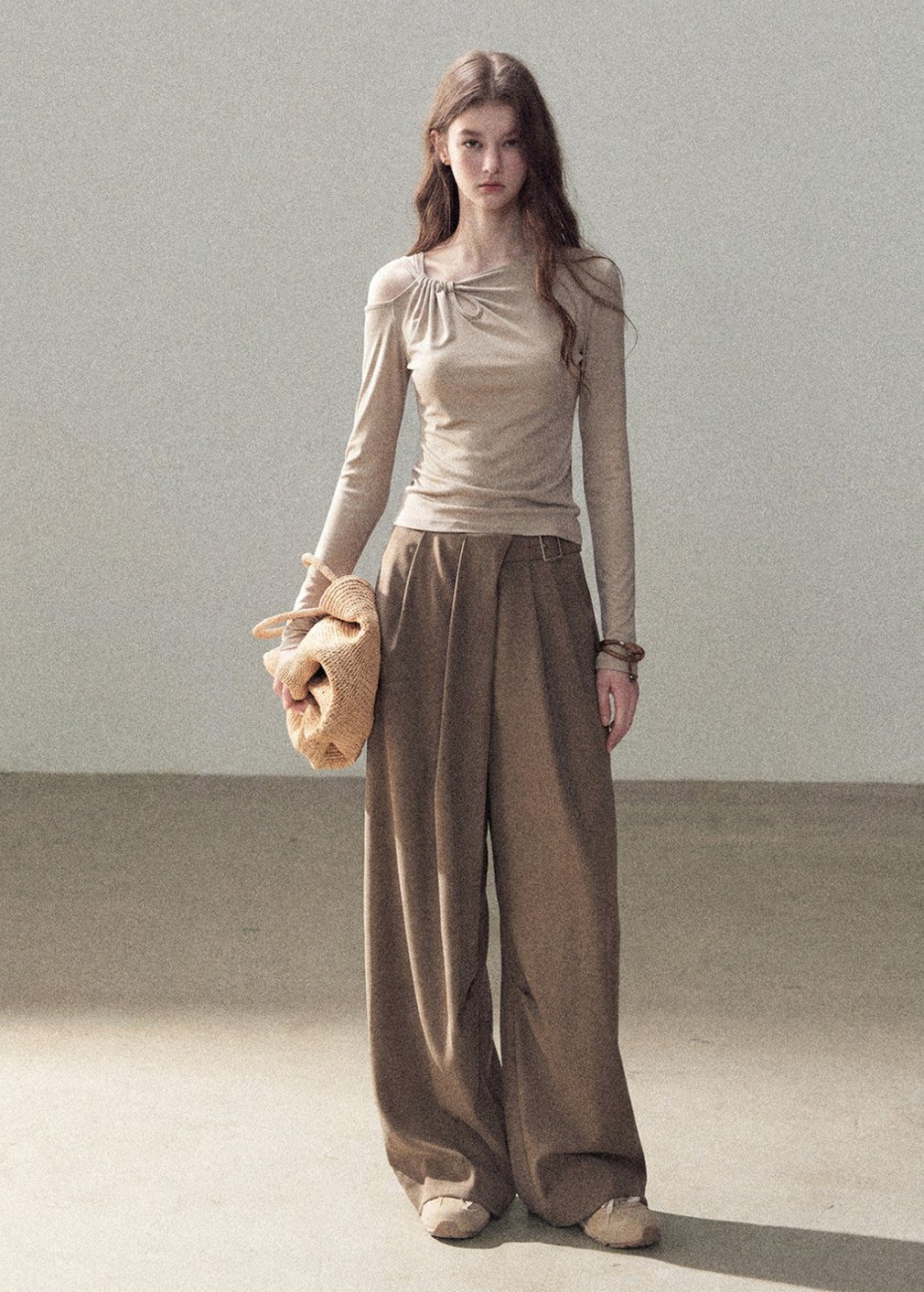 Warm taupe fitted top with elegant neckline