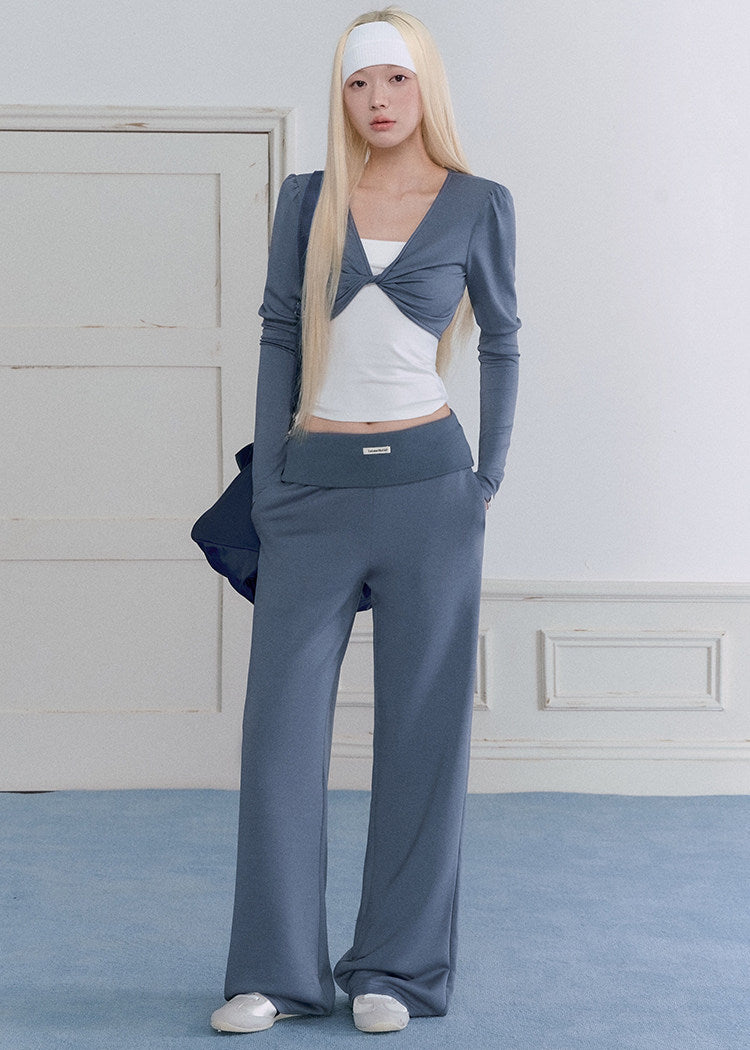 Women’s ballet-style fitted top and relaxed casual pants matching set