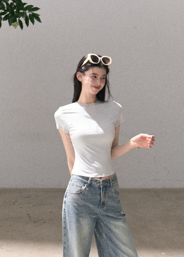 Relaxed cotton denim jeans with ripped knee detail