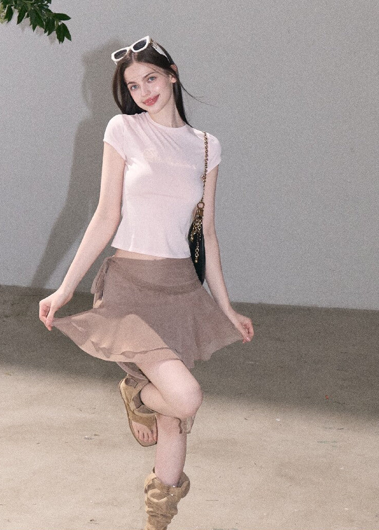 Tiered mini skirt with soft flowing detail