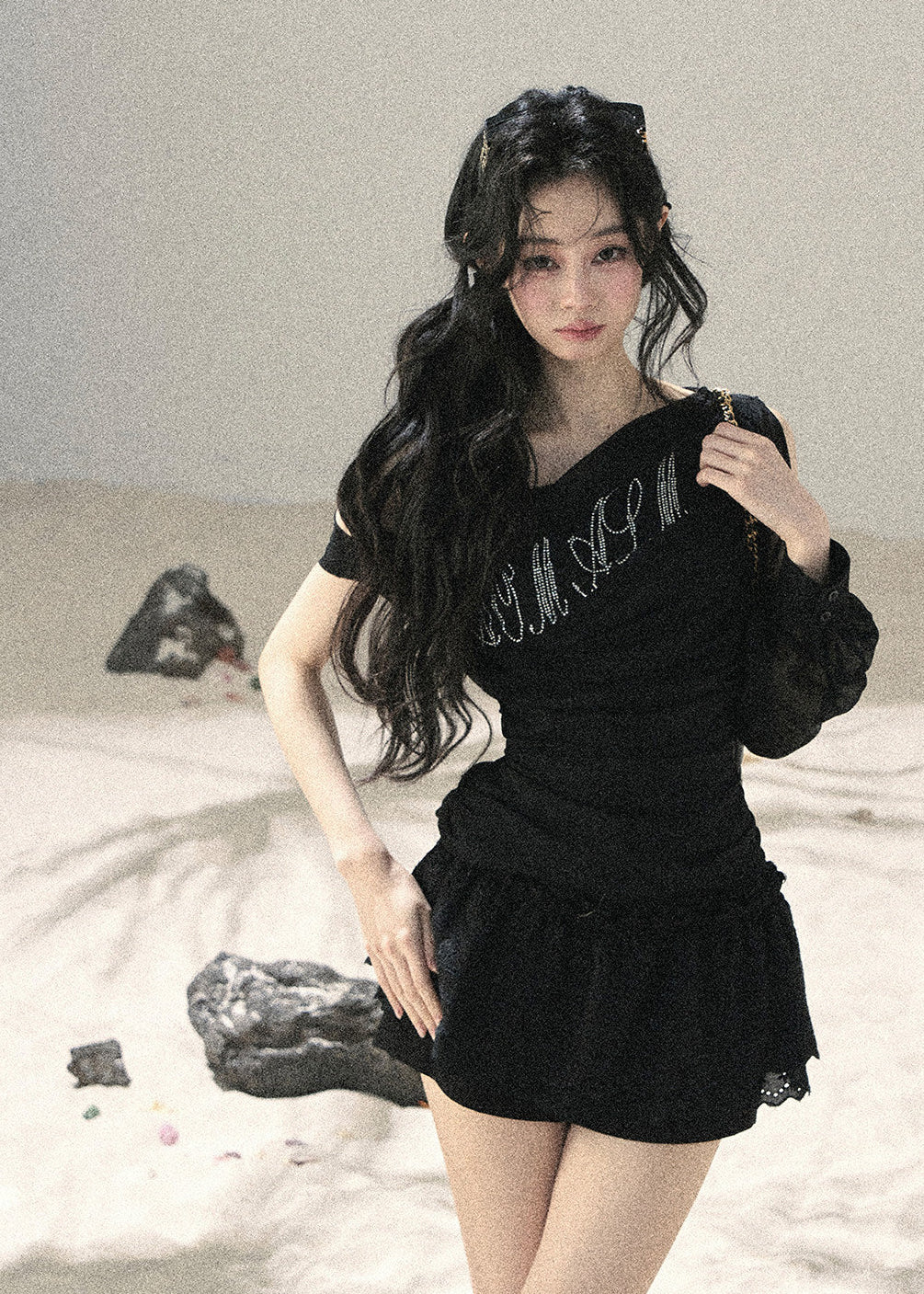 Black fitted off-shoulder top with sparkling front detail