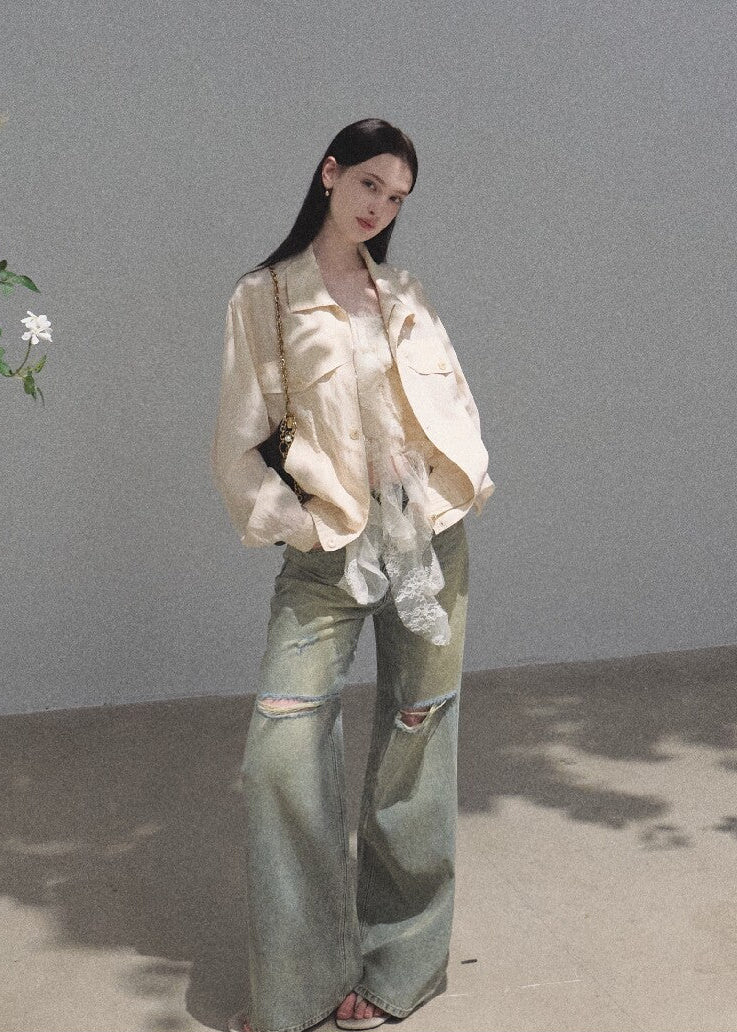 Pure cotton distressed jeans featuring a loose wide-leg silhouette