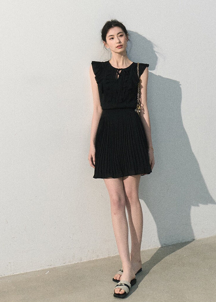 Black ruffle pleated dress with a feminine A-line silhouette