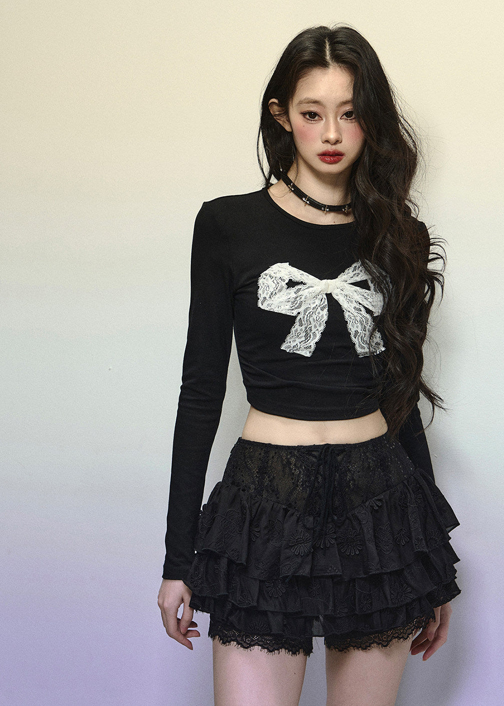 Feminine lace ruffle skirt styled with sheer top