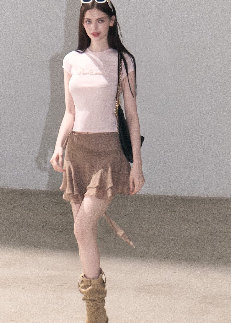 Tiered mini skirt with soft flowing detail