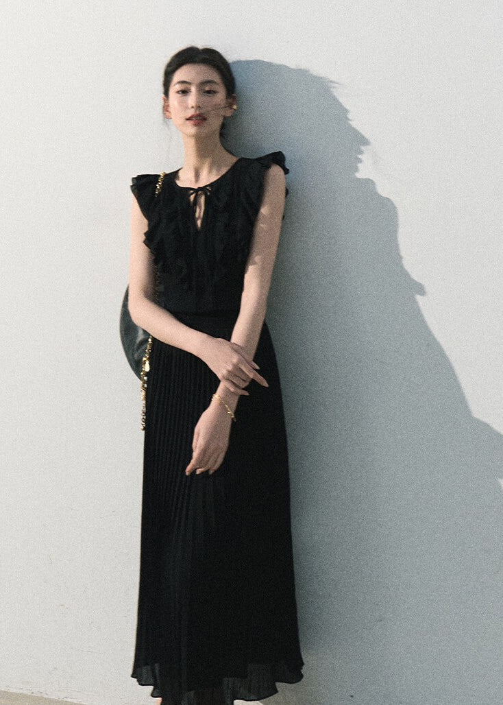 Black ruffle pleated dress with a feminine A-line silhouette