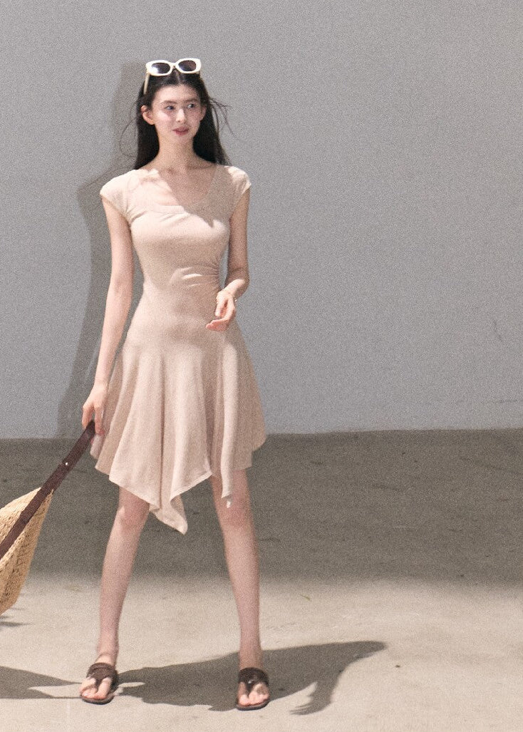 Soft green sleeveless midi dress with elegant drape