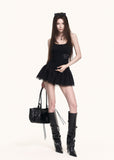 Fitted black two-piece set with bubble sleeves