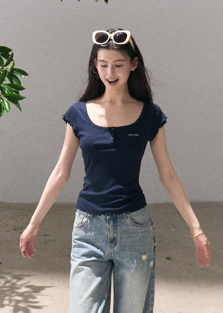 Light blue rhinestone jeans with a wide-leg silhouette