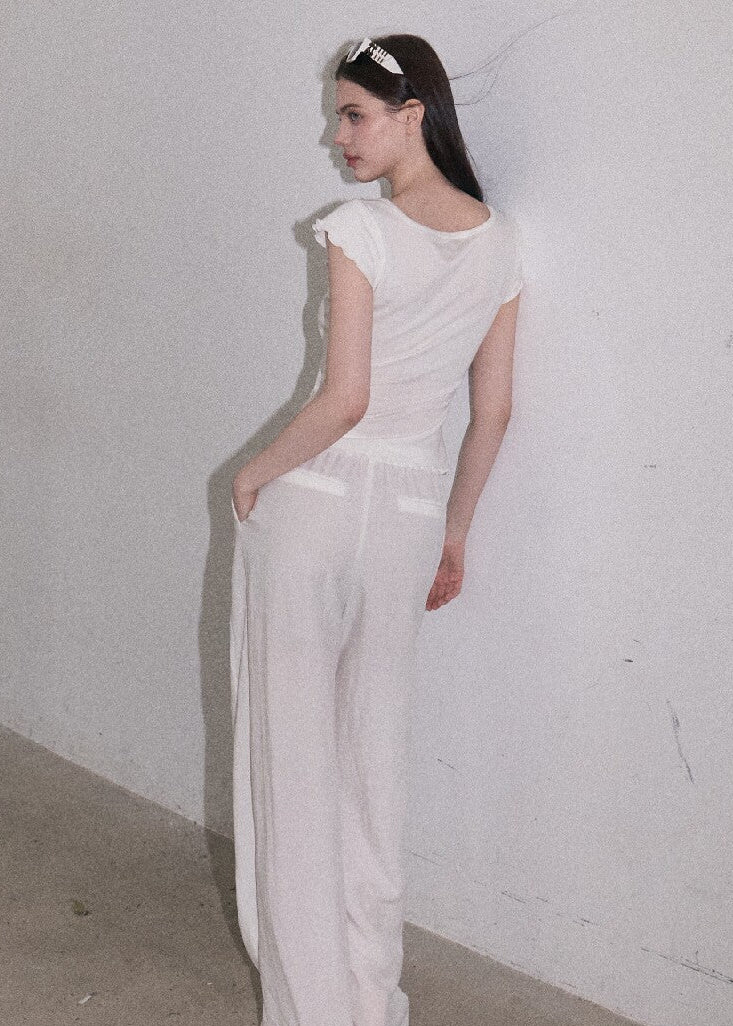 Short-sleeve U-neck top with subtle embroidery