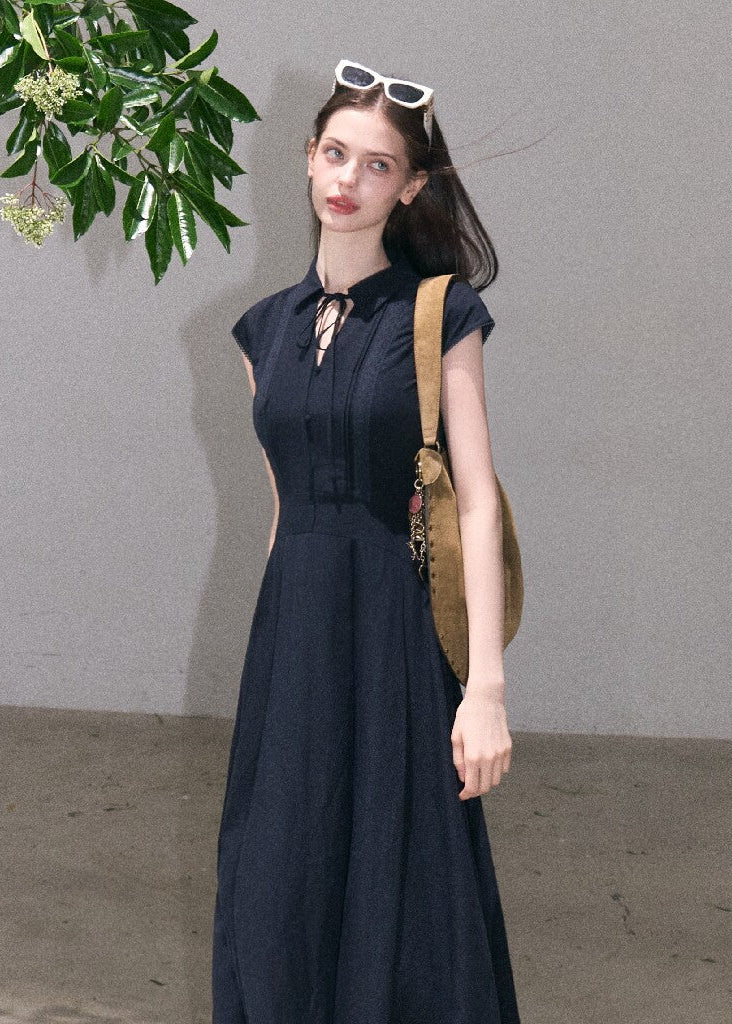 Navy blue waist-cinching midi shirt dress