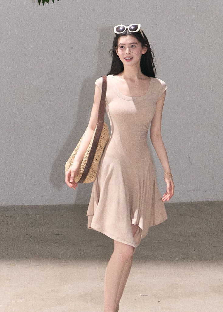 Slim fit sleeveless dress with soft flowing skirt