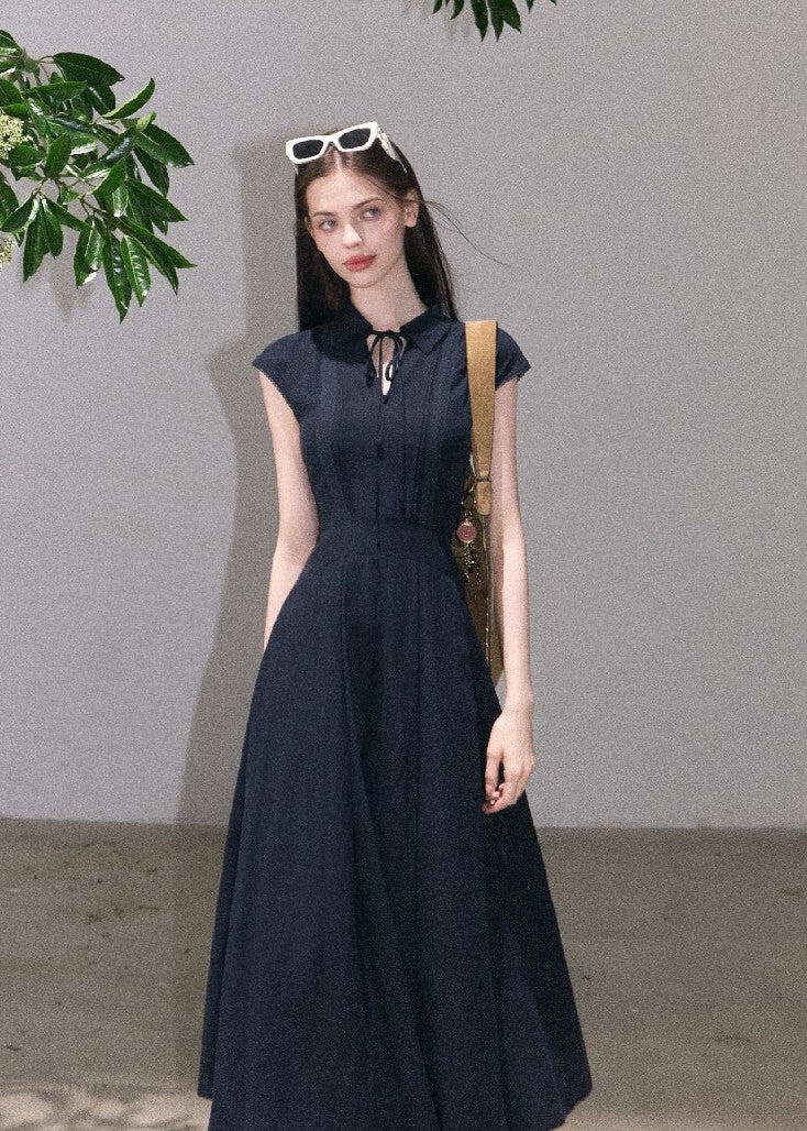 Long navy blue collared dress with fitted waist