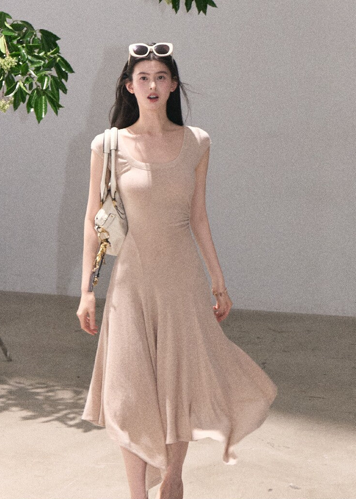 Slim fit sleeveless dress with soft flowing skirt